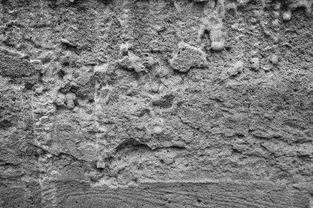 istock Textured surface revealing intricate patterns of weathered concrete 2199877542