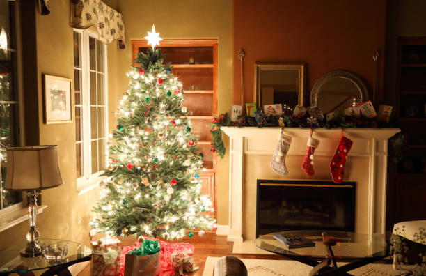 istock Christmas Tree and Stockings on Fireplace Horizontal 2199879817