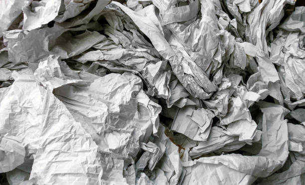 istock Wrinkled white color paper textured background. 2199880059