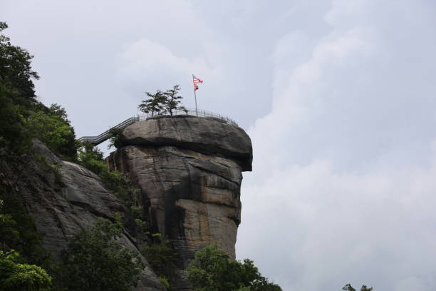 Eco tourism, North Carolina, NC, Chimney Rock, lake Lure, Waterfalls, American Flag, tourist, sport ware, active ware, wonders, nature, awesome, forest, valley, sky, clouds, hiking, climbing, destination, vacation, active, summer, cloudy, high