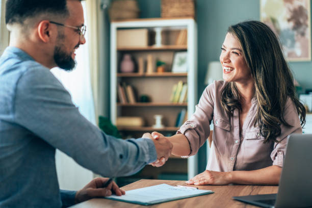 istock Successful Contract Signing Handshake in Modern Office 2199891687