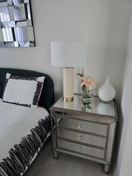 istock Elegant Modern Bedroom Interior with Mirrored Nightstand 2199893027