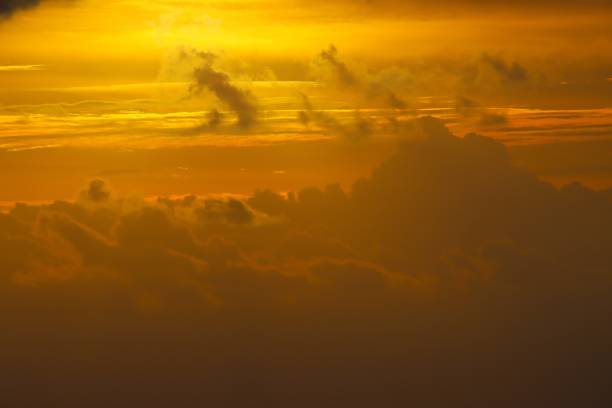 Sunrise Majesty: Golden Light Over Cloudscape at Playa del Carmen, Mexico