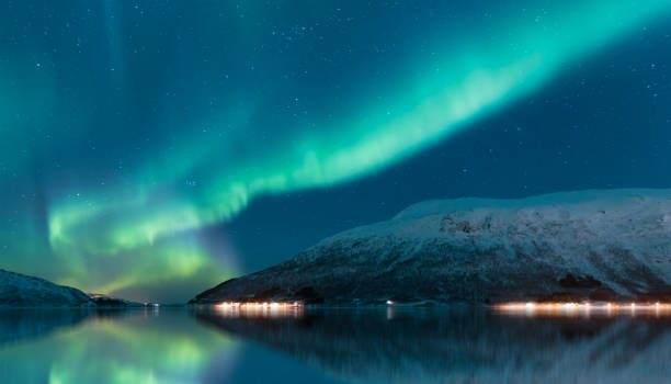 istock Northern lights or Aurora borealis in the sky - Tromso, Norway 2199909498