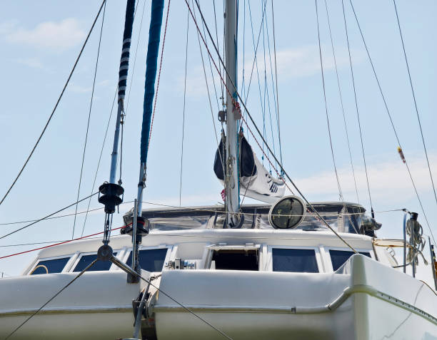 istock A white voyage boat featuring a steering wheel floating in the water 2199912243