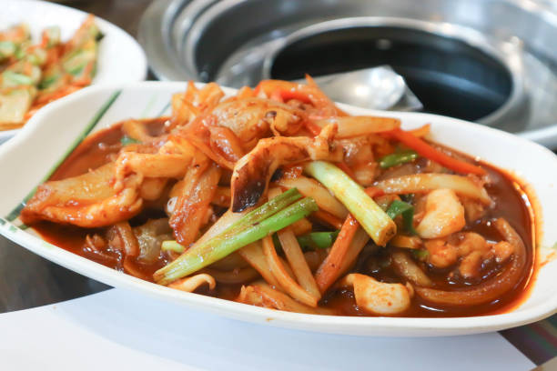 istock stir fried squid or stir fried spicy squid with onion 2199914409