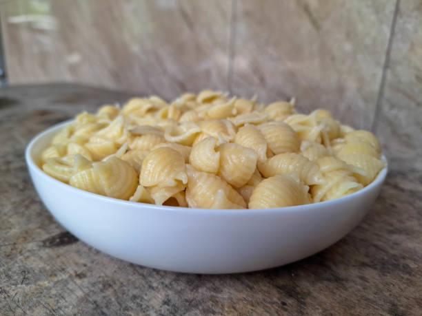 istock Yummy Shell Conchiglie Macaroni Pasta On A Plate. Food Menu. 2199915549