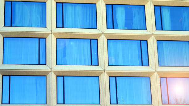 istock Large glass windows in a modern hotel building. 2199921705