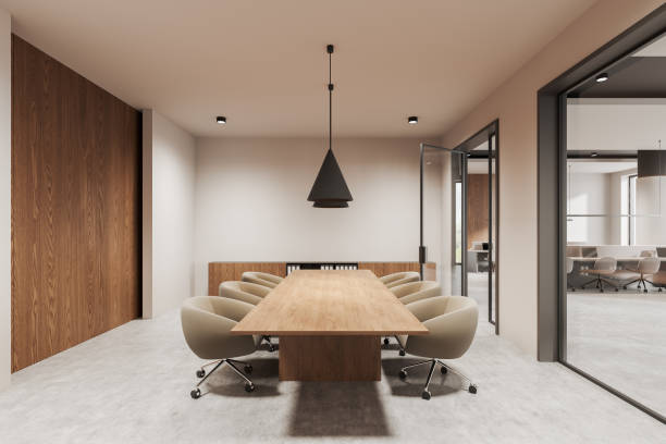 istock Modern open-space office interior with large windows, cityscape view, and rows of desks and chairs. 3D Rendering 2199926410
