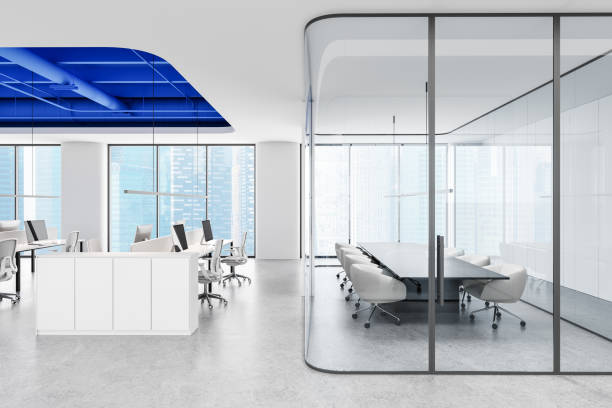 istock Modern open-space office interior with large windows, cityscape view, and rows of desks and chairs. 3D Rendering 2199926759