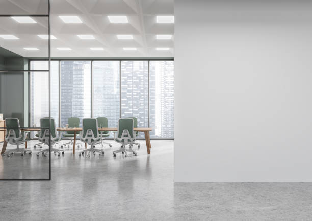 istock Modern open space office interior with empty white wall and conference room in background. 3D Rendering 2199926833