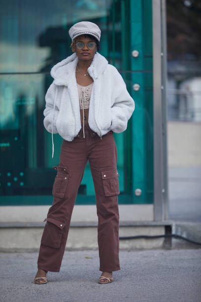 istock black lady with luggage at metro elevator entrance 2199927007