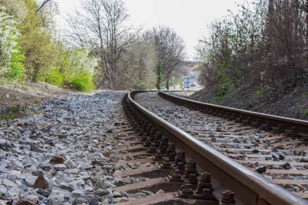 istock .a section of railway with two tracks running through a scenic area. 2199927381