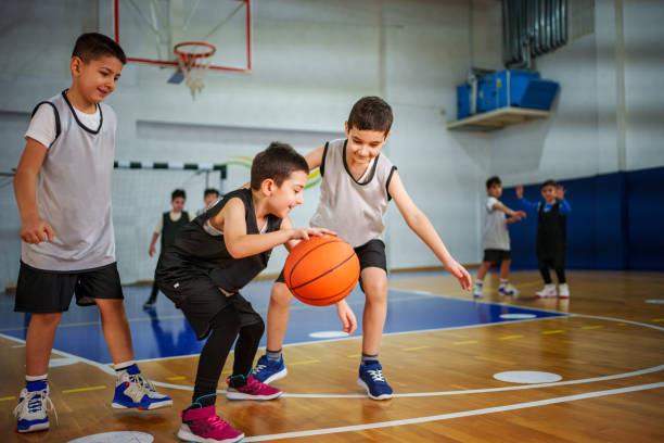 istock Junior basketball team is practicing game at indoor court 2199931149