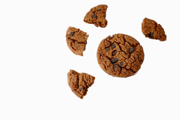istock crumbs and broken chocolate cookies isolated on a white background 2199933299