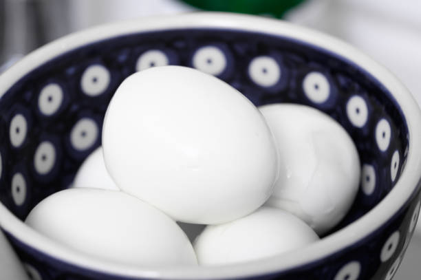 istock Peeled hard-boiled eggs without shells lie in a bowl ready to eat for breakfast 2199939404