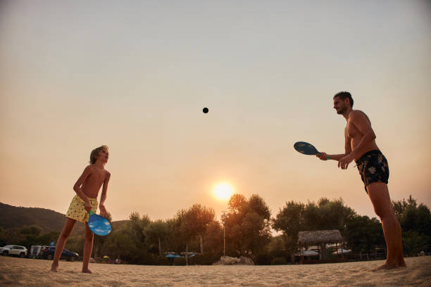 istock Playful family enjoying summer vacation 2199941387