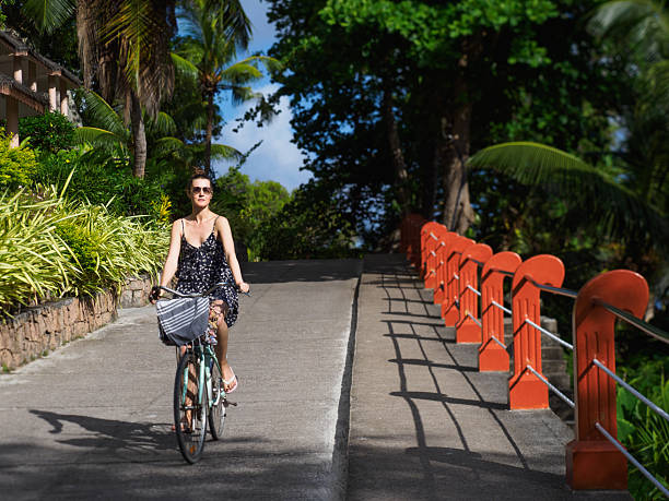 istock Cute woman with vintage bicycle. Clear, sunny day 2199942673