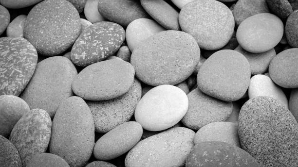 istock abstract black and white background with round pebble stones 2199944046