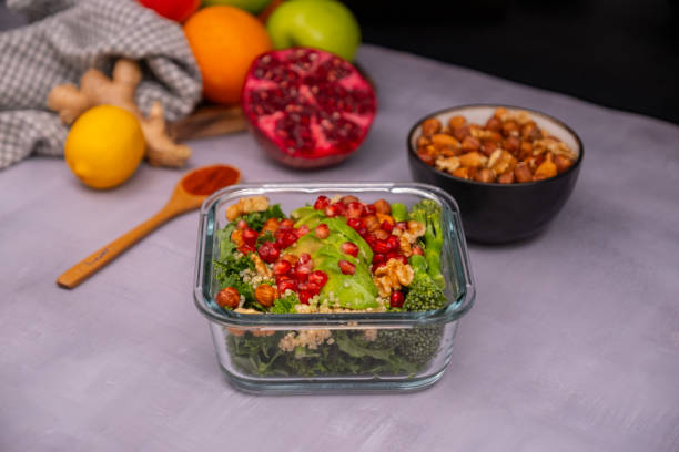 istock Superfood salad with kale, avocado, quinoa, broccoli, pomegranate and nuts 2199945621