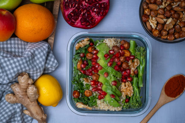istock Fresh salad with kale, avocado, quinoa, broccoli, pomegranate and nuts 2199945710