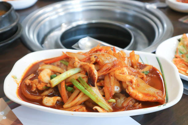 istock stir fried squid or stir fried spicy squid with onion 2199954414