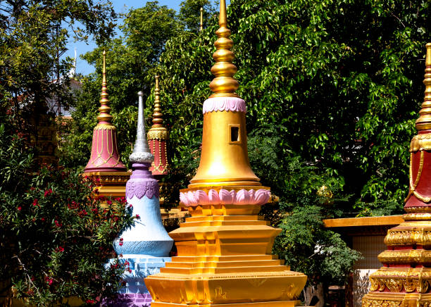 Shot in color detail on the facade of this historic building representing some character, animal or flower. Set at Siem Riep, Angkor Wat , Cambodia, Asia