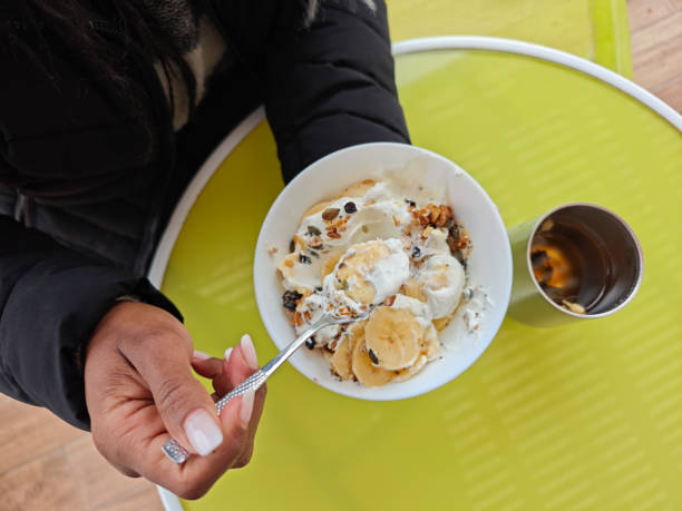 Healthy Breakfast with Yogurt, Granola, and Banana.