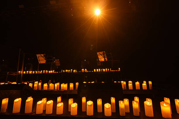 concert stage with lots of candles for design purpose