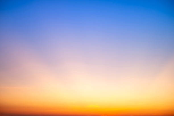 istock Beautiful , luxury soft gradient orange gold clouds and sunlight on the blue sky perfect for the background, take in evening,Twilight, Large size, high definition landscape photo 2199965887
