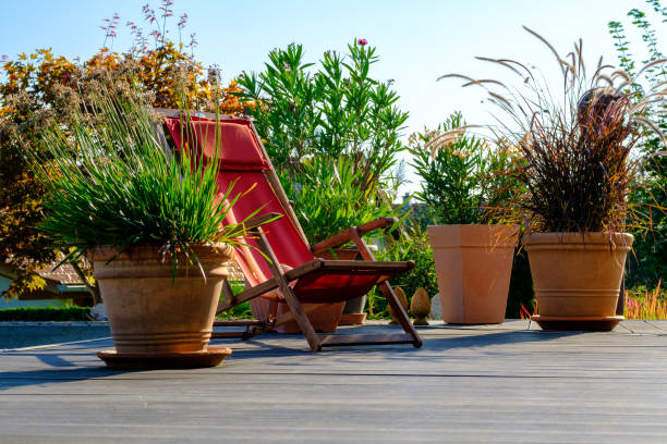 Folding deck chair on a sunny terrace deck