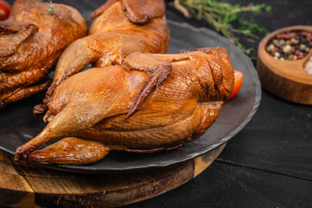 istock smoked quail, Delicious meat with spices and herbs. top view, 2199967625