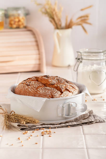 istock Multigrain round loaf bread baked in home bakery. 2199970537