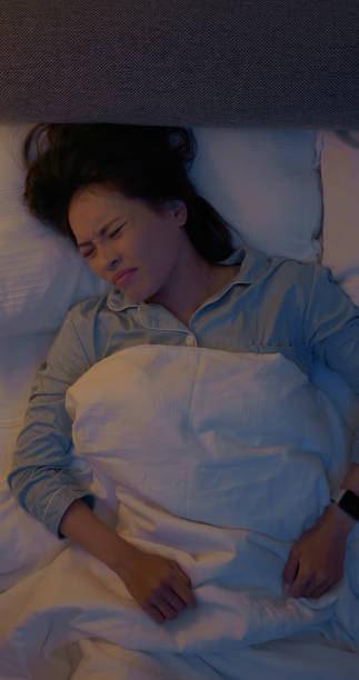 istock asian woman poor sleep quality 2199970935
