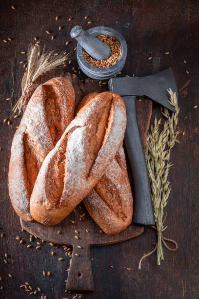 istock Homemade lumberjack bread with grains and ears. 2199973160