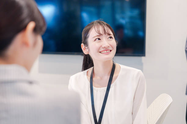 istock Young career woman working happily in an office 2199980981