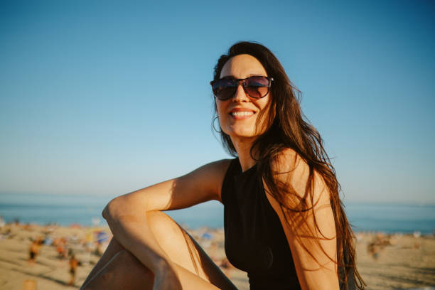 istock Relaxing at the beach in Barcelona, Spain 2199984516