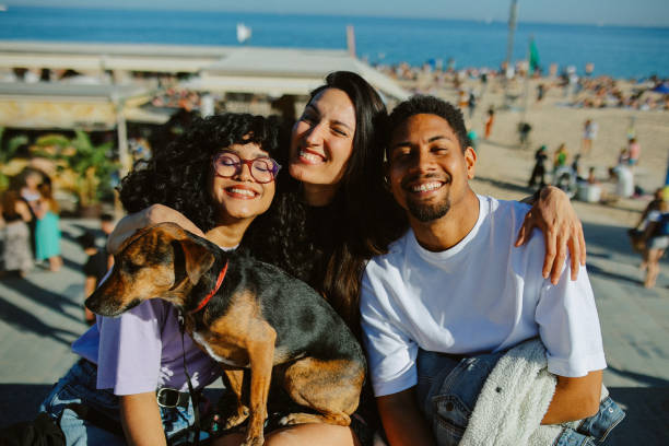istock Friends enjoying the beach in Barcelona, Spain 2199984698