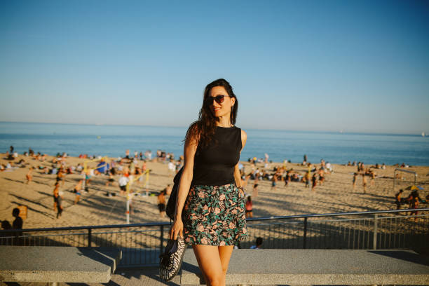 istock Relaxing at the beach in Barcelona, Spain 2199984888