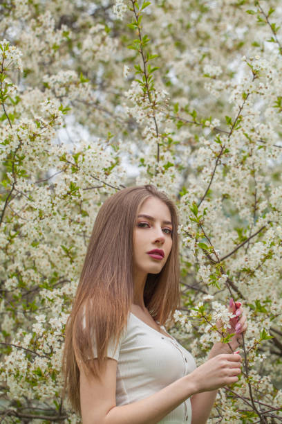 istock Attractive spring lady. Beautiful woman outdoors portrait 2199985990