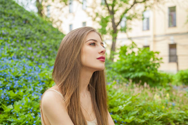 istock Cheerful spring lady. Beautiful woman outdoors portrait 2199986006