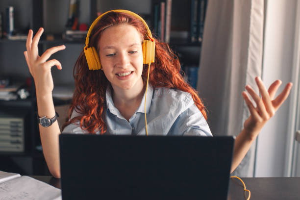 istock Millennial student sit at desk study on laptop 2199991892