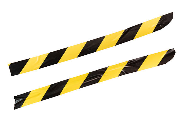 istock Yellow and black barricade tape 2199992702