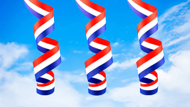 Serpentine curl from the dutch national flag from the Netherlands against a blue sky