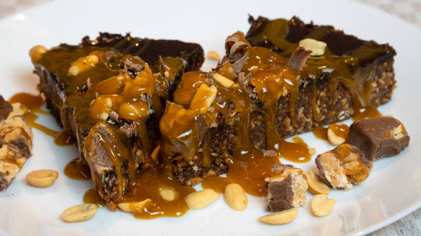 istock Snickers cake with lots of peanuts and caramel 2199994676