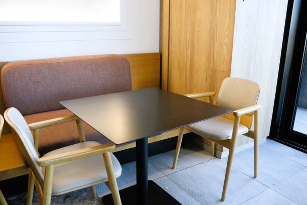 istock Modern Cafe Seating Featuring Beautiful Wooden Accents and a Stylish Table Design 2199997256