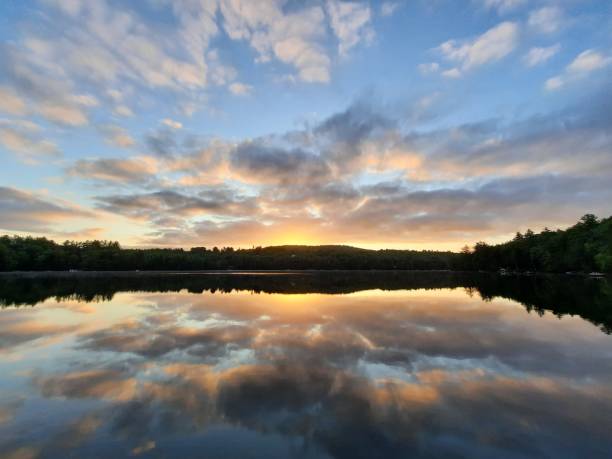 istock Vibrant skies reflected over a still lake 2200000648