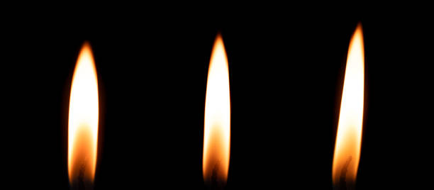 istock Candle burning in the dark. Candlelight in the night 2200002913