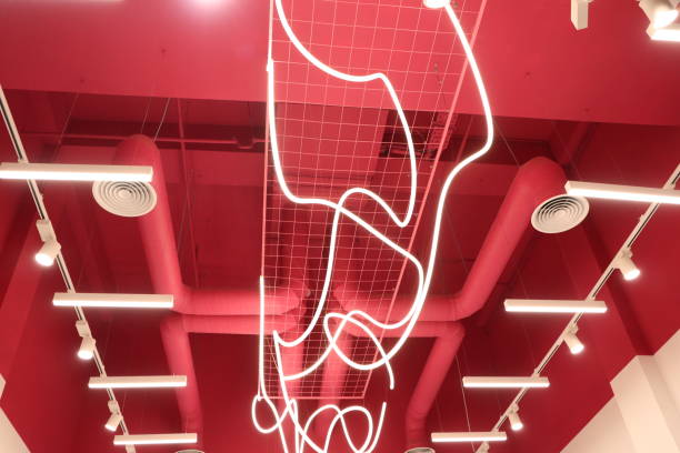 A Modern Ceiling Design featuring an Artistic Neon Light to Enhance the Spaces Ambiance