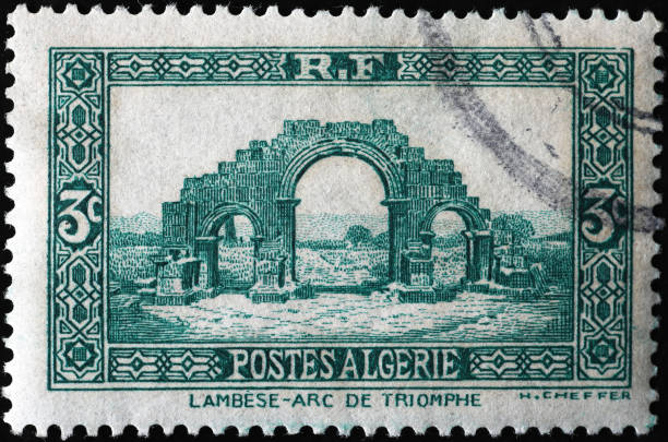 Ancient triumphal arch on vintage algerian postage stamp
